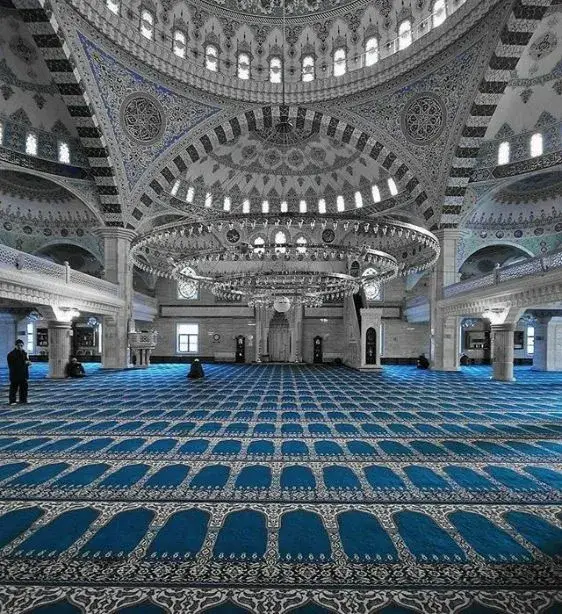Blue Prayer Carpet with arch-shaped patterns